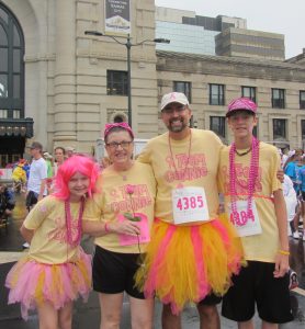 Connie and Mike Smith, along with their children Matthew and Madeline, celebrate at the 2014 Race for the Cure in Kansas City.