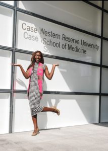 Megan sharp standing in front of Case Western Reserve University School of Medicine