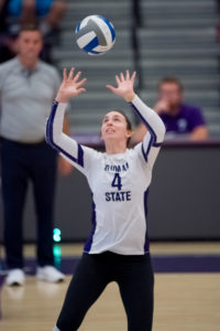 Tori hitting volleyball
