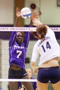 Megan Sharpe playing volleyball